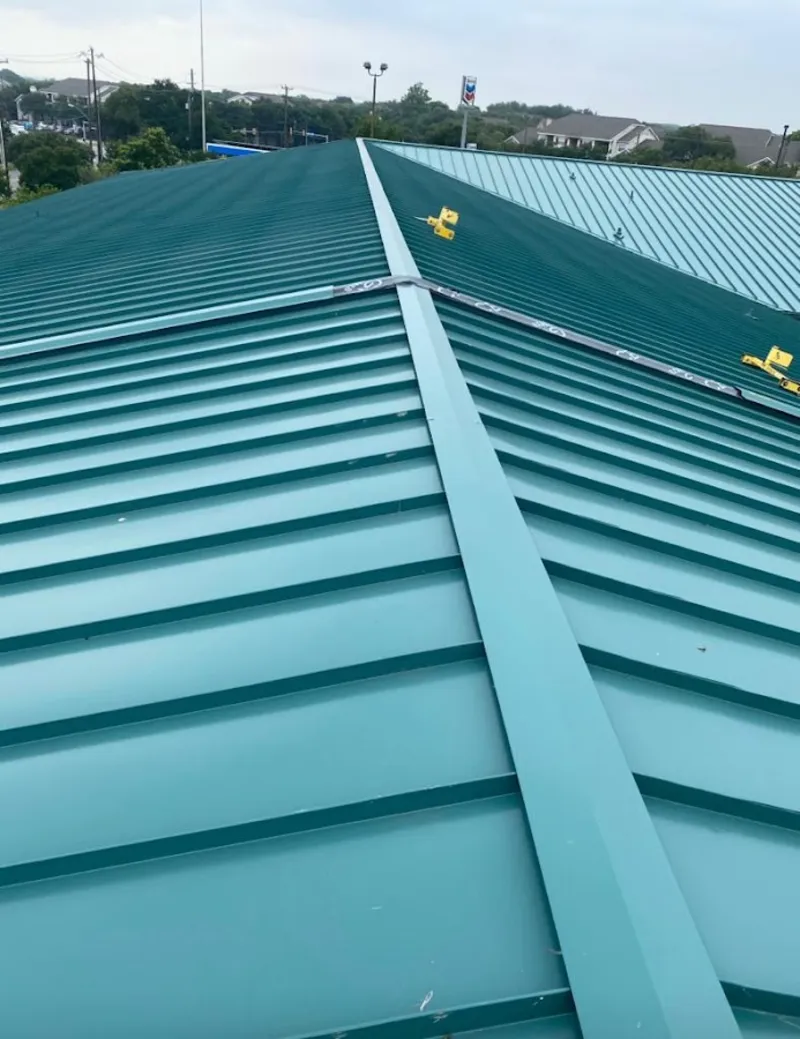Green commercial metal roof ridge and valley for Metal Roof Repair in Highlands